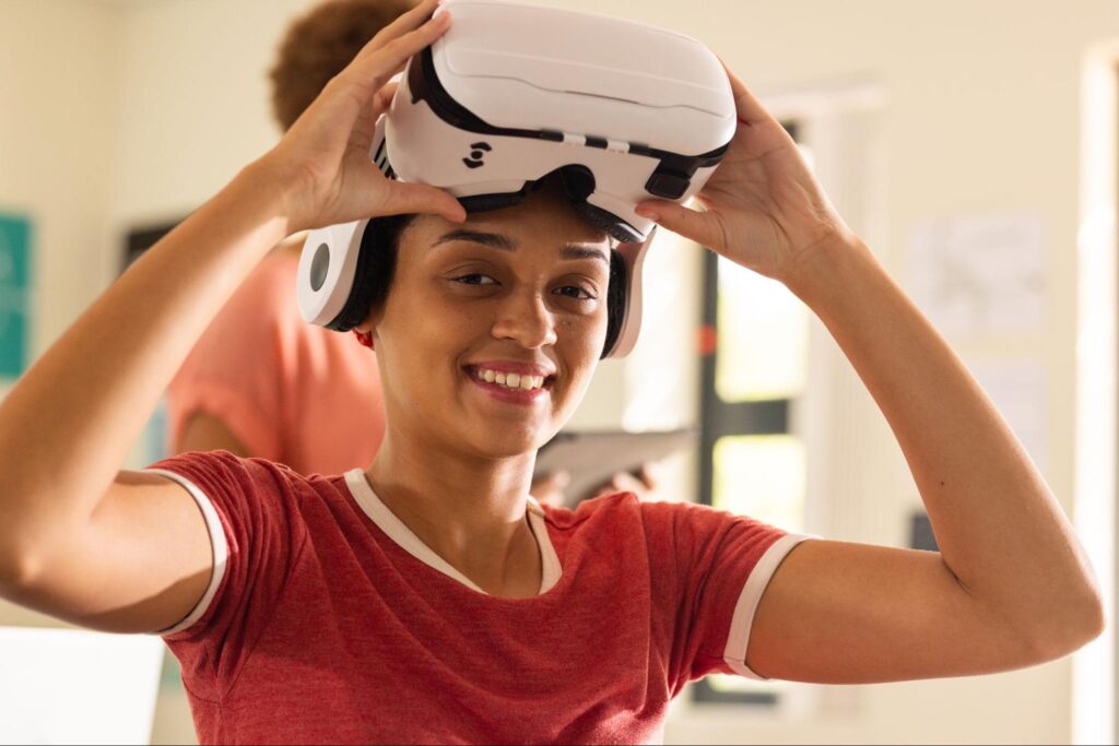 Woman wearing virtual reality goggles.