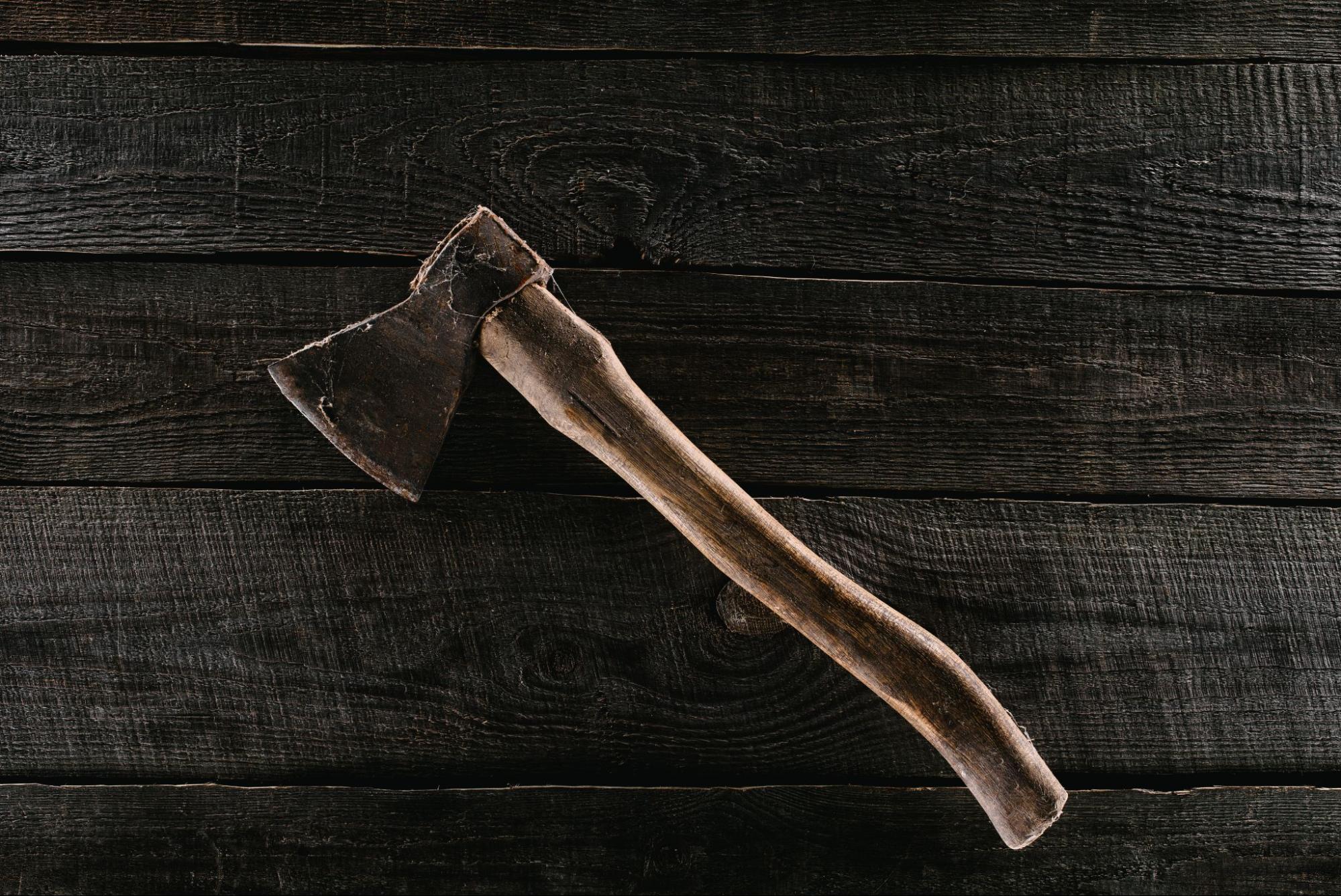 Axe on a wooden surface. 